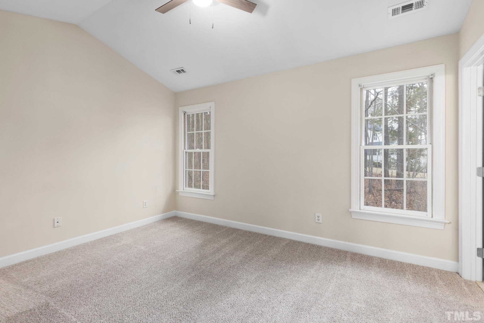 4313 Timberwood Drive Raleigh, NC 27612 - Photo 20 of 28 an empty room with a window