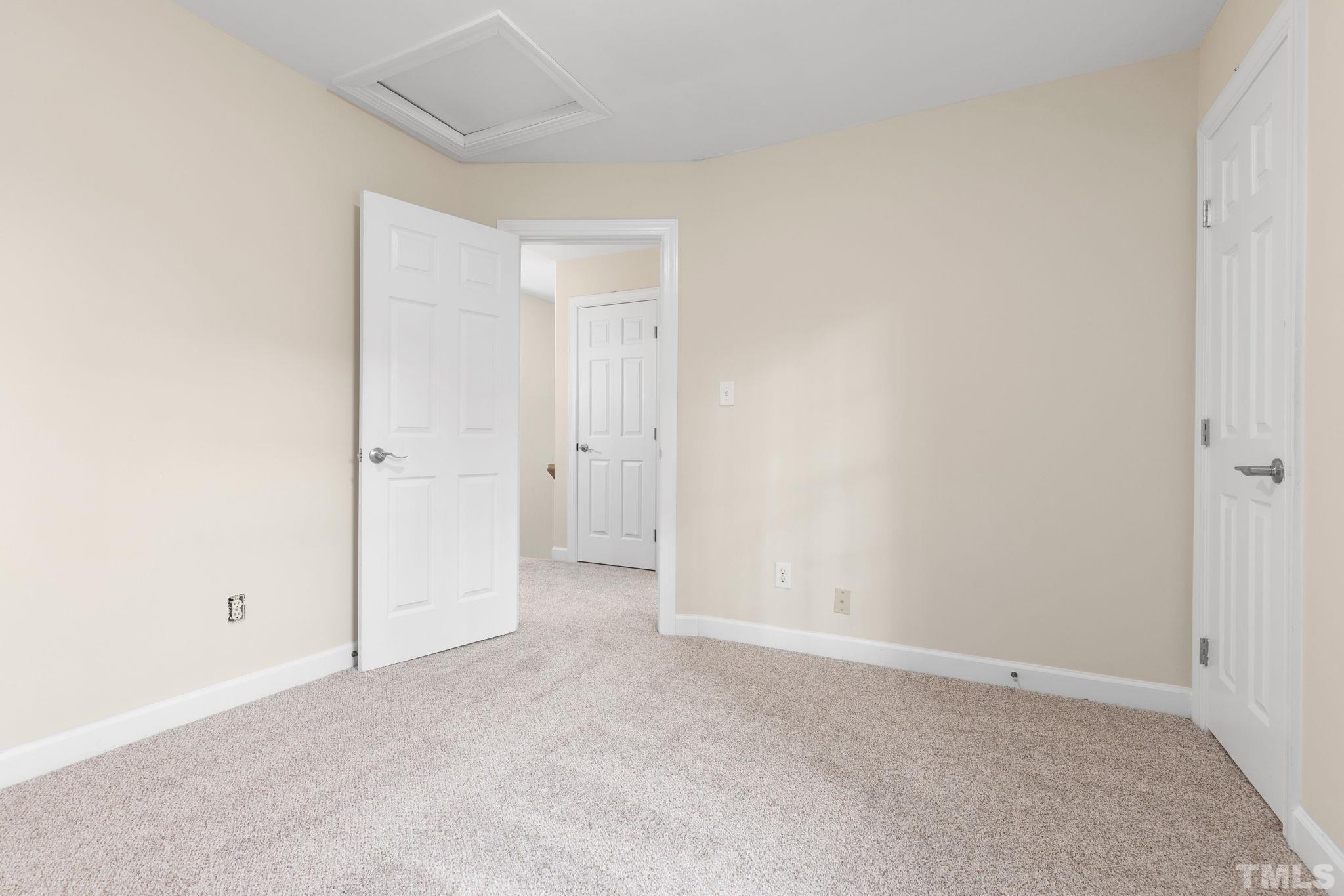 4313 Timberwood Drive Raleigh, NC 27612 - Photo 24 of 28 a view of an empty room