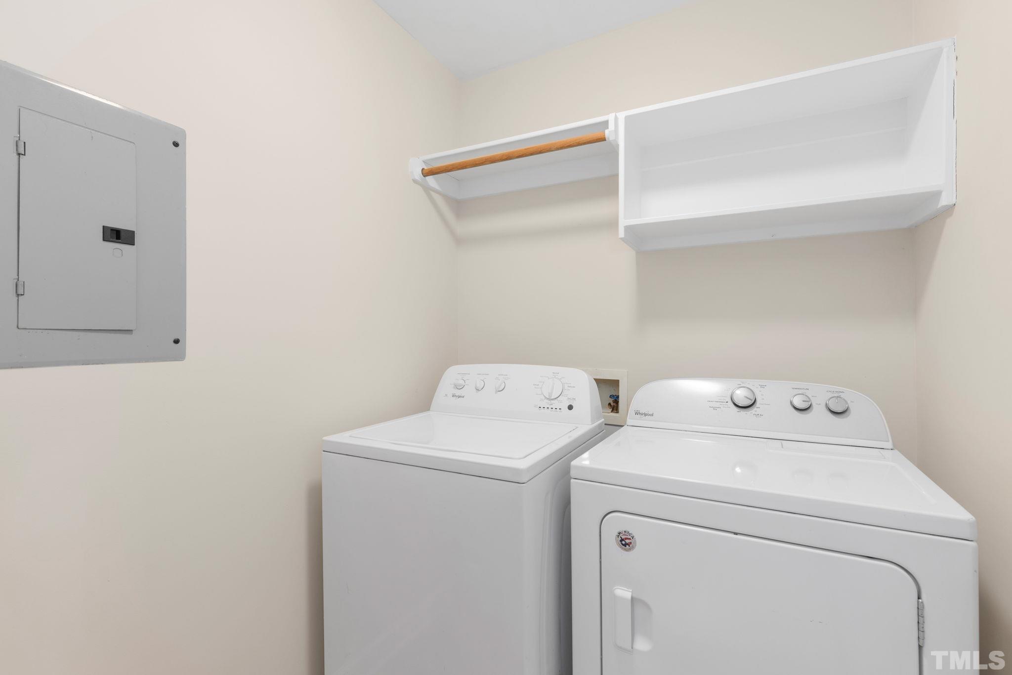 4313 Timberwood Drive Raleigh, NC 27612 - Photo 10 of 28 a view of storage and utility room with washer and dryer
