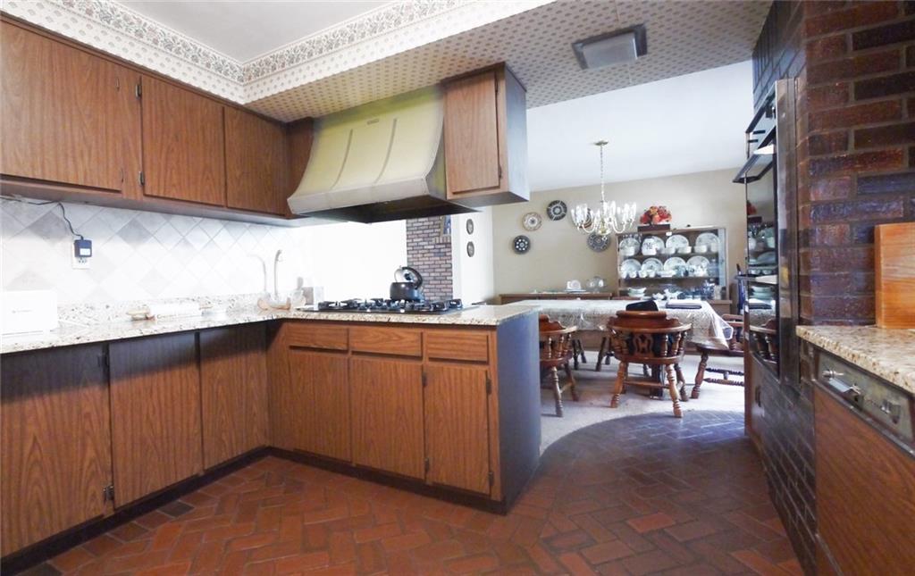 150 Killarney Road Wexford, PA 15090 - Photo 9 of 24 Gourmet kitchen with brick floors.