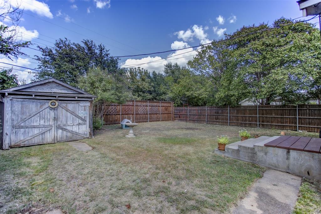 2220 West Rosedale Street South Fort Worth, TX 76110 - Photo 28 of 33 a backyard of a house with portable swimming pool and outdoor seating