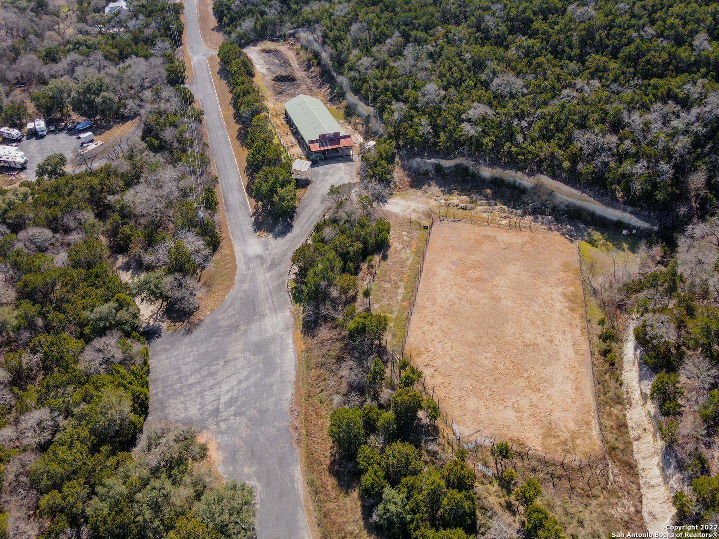 437 Private Rd 1706 Helotes, TX 78023 - Photo 1 of 8 an aerial view of residential house with outdoor space and swimming pool