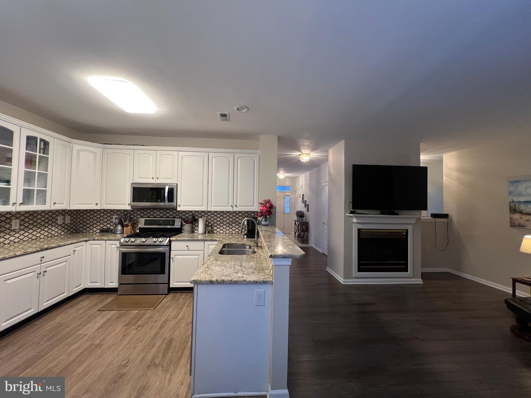 1475 Quaker Ridge West Chester, PA 19380 - Photo 17 of 51 Kitchen and Family Room view