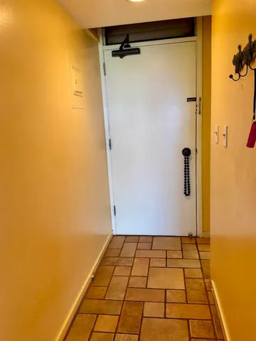 a view of a swimming pool with a yard