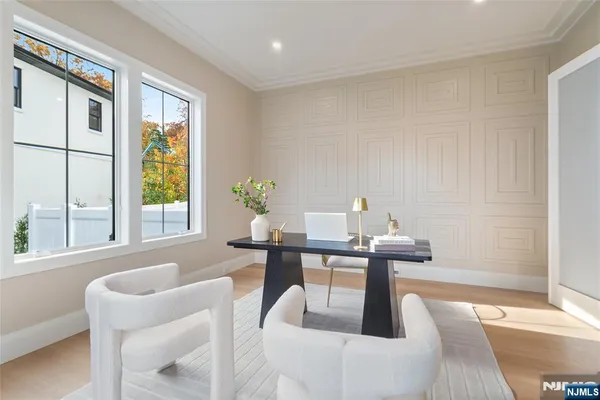 a view of a dining room with furniture window and outside view