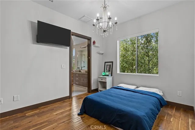 a bathroom with a tub sink and window