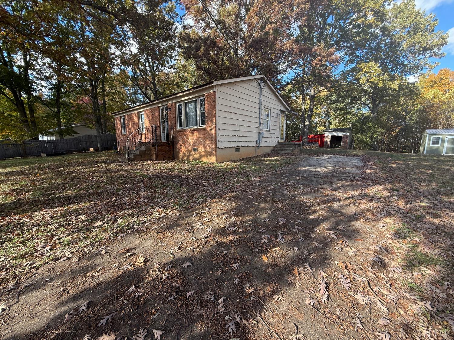 2600 Bethany Road Rustburg, VA 24588 - Photo 10 of 16 a view of backyard of house with trees