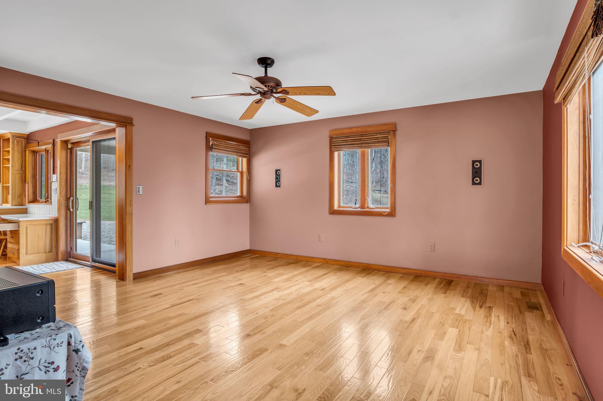 125 Bobcat Road Carlisle, PA 17015 - Photo 17 of 83 a view of empty room with wooden floor and fan