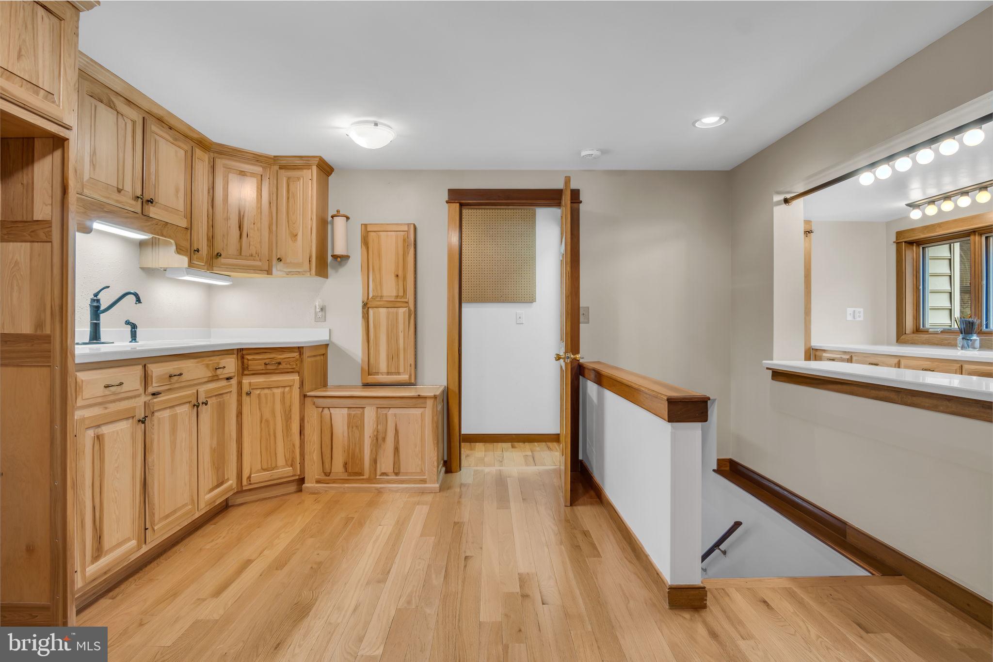 125 Bobcat Road Carlisle, PA 17015 - Photo 23 of 83 a kitchen with white cabinets and wooden floor