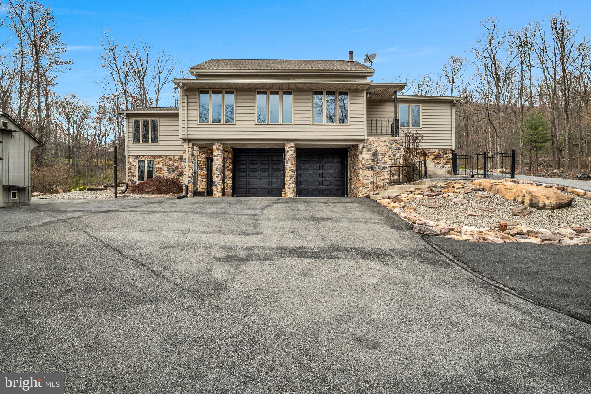 125 Bobcat Road Carlisle, PA 17015 - Photo 48 of 83 a front view of a house with yard and parking