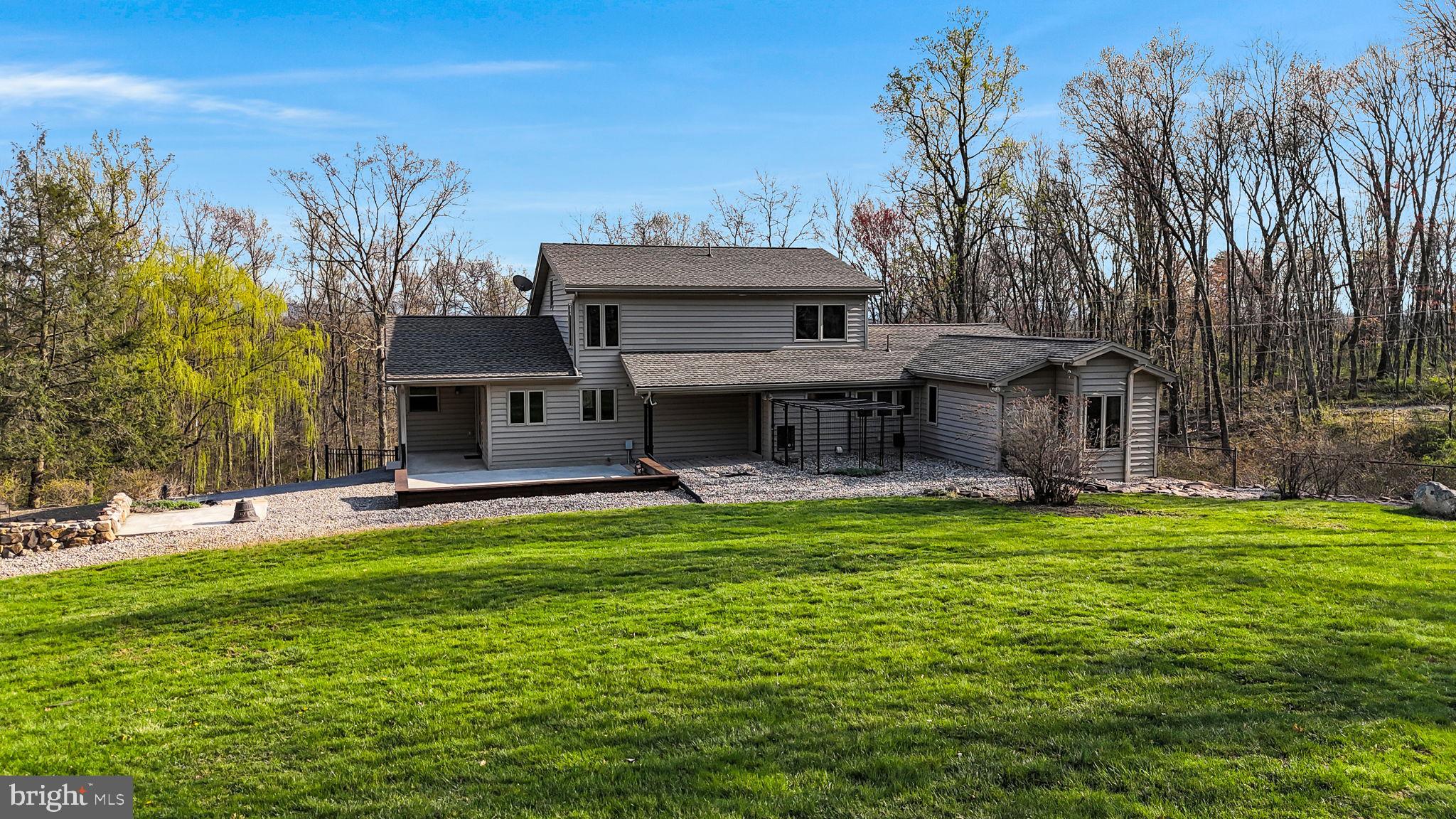 125 Bobcat Road Carlisle, PA 17015 - Photo 56 of 83 a view of a house with a yard and sitting area