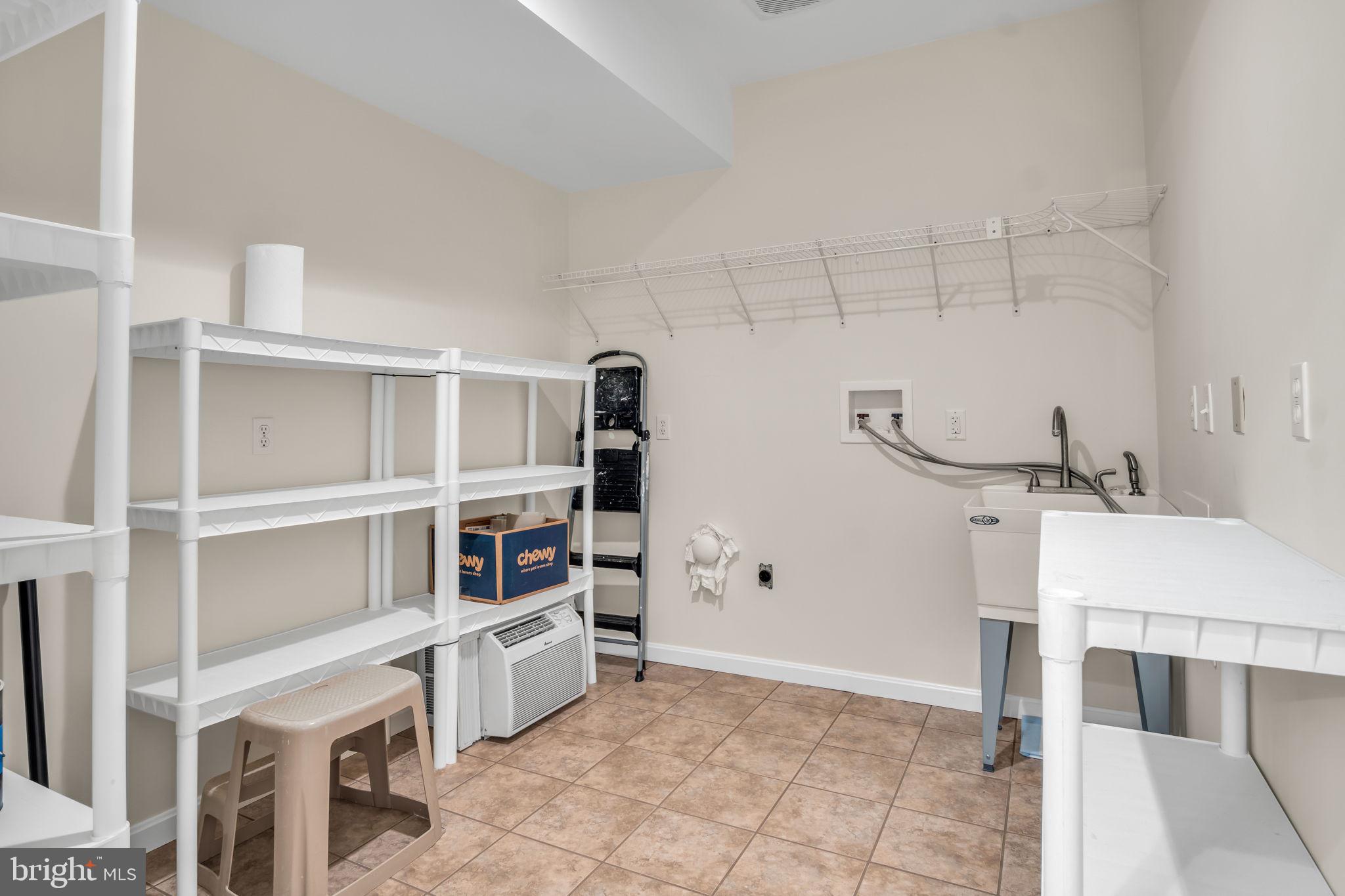 125 Bobcat Road Carlisle, PA 17015 - Photo 65 of 83 1st floor laundry room and half bath