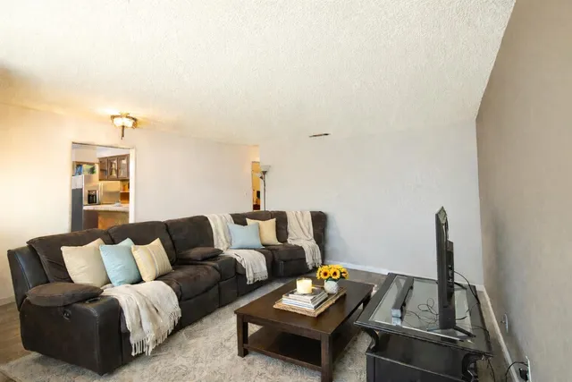 a kitchen with a dining table and chairs