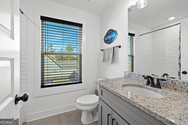 a view of a workspace with furniture