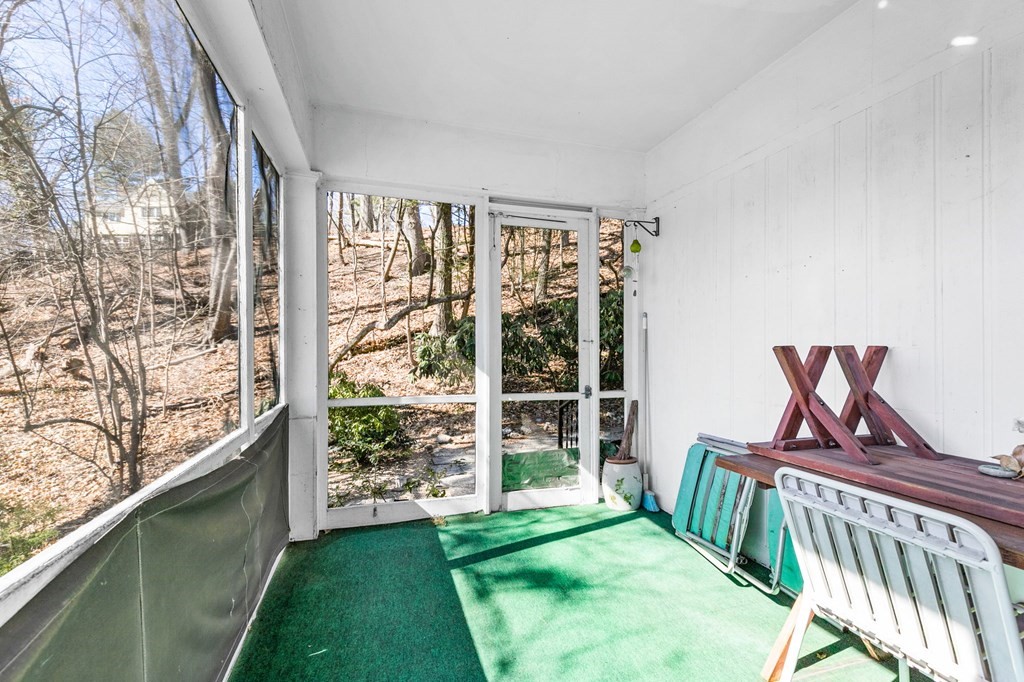 177 Varick Road Newton, MA 02468 - Photo 17 of 29 a view of a porch with furniture