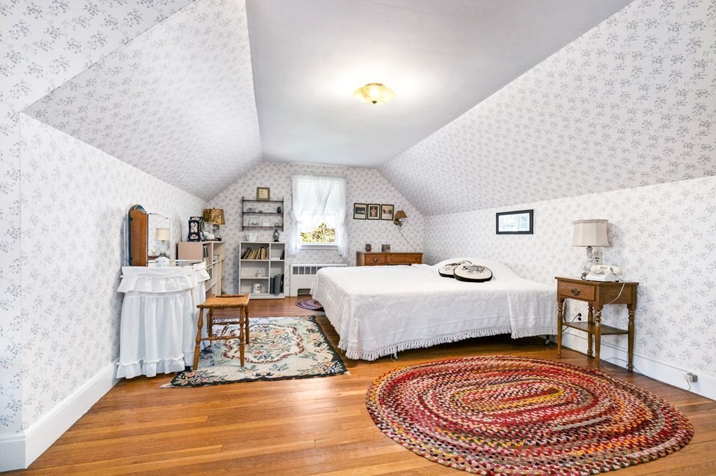 177 Varick Road Newton, MA 02468 - Photo 6 of 29 a living room with furniture and a rug