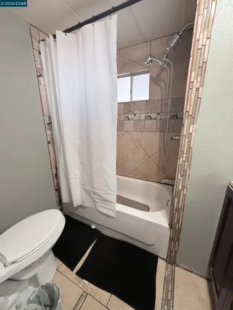 a bathroom with a sink and a shower