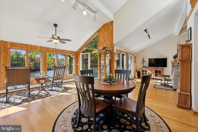 a view of a dining room with furniture window and outside view