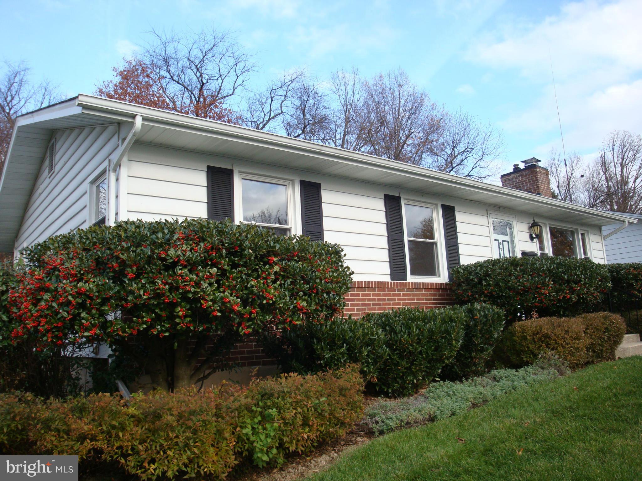 2414 Windsor Road Baltimore, MD 21234 - Photo 22 of 25 a front view of house with a garden
