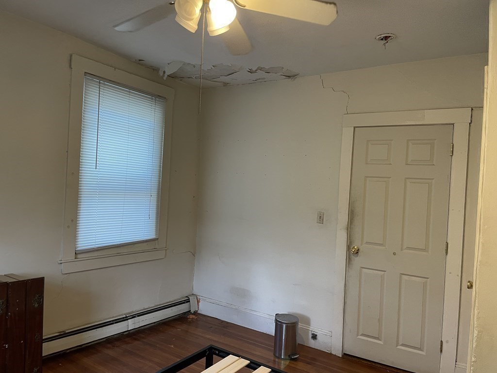 133 Fayerweather Street Cambridge, MA 02138 - Photo 22 of 27 a view of a room that has a window in it