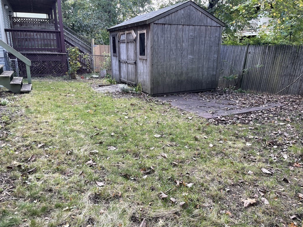 133 Fayerweather Street Cambridge, MA 02138 - Photo 26 of 27 a view of backyard with wooden fence