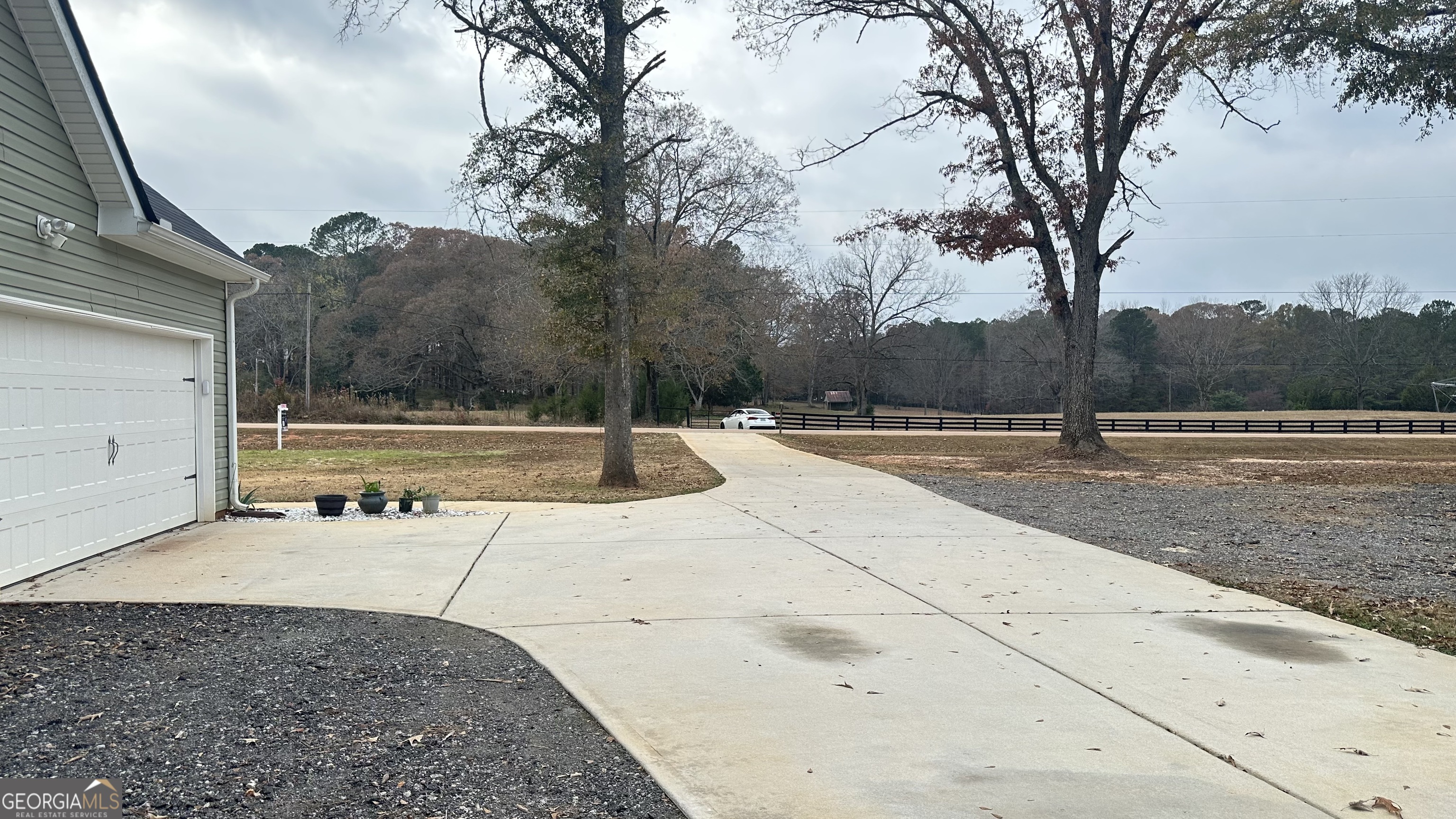 2046 Mcwilliams Barber Road Luthersville, GA 30251 - Photo 11 of 43 a view of a swimming pool with an outdoor space