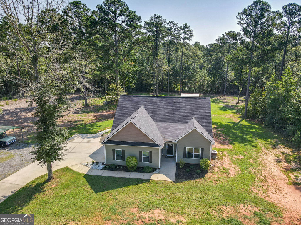 2046 Mcwilliams Barber Road Luthersville, GA 30251 - Photo 17 of 43 a front view of house with yard and green space