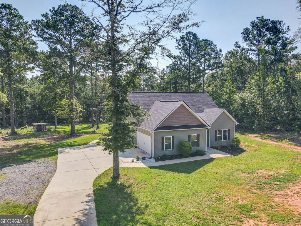 2046 Mcwilliams Barber Road Luthersville, GA 30251 - Photo 18 of 43 a view of house with outdoor space and garden