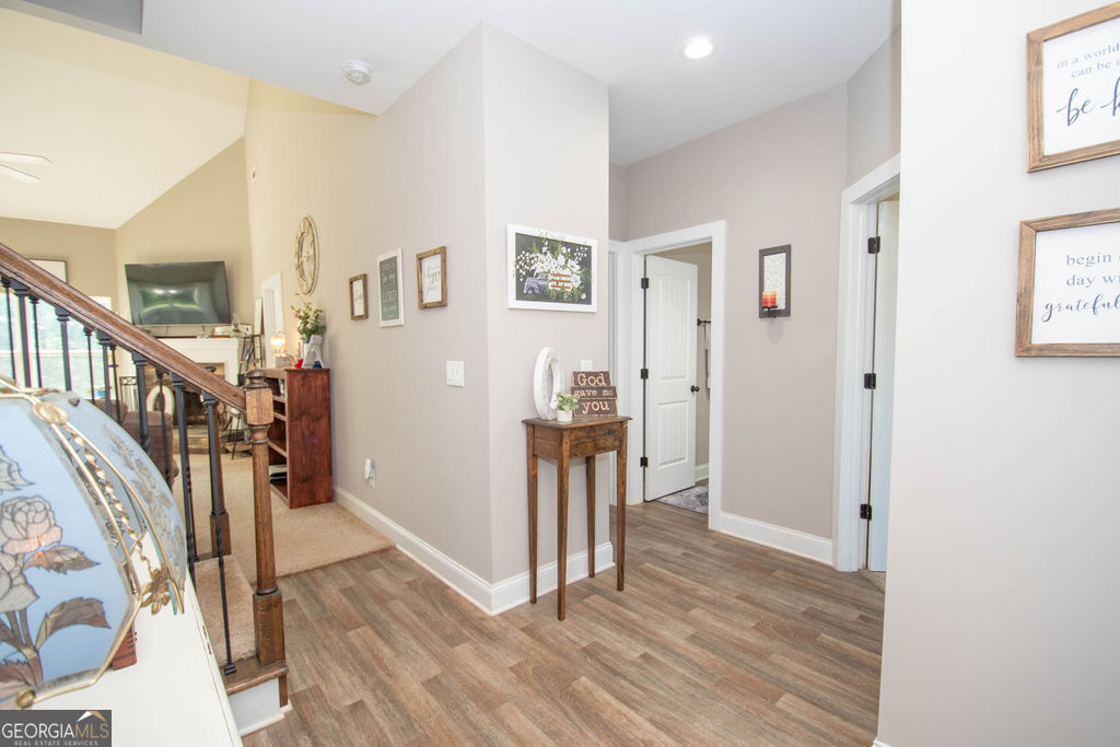 2046 Mcwilliams Barber Road Luthersville, GA 30251 - Photo 19 of 43 a view of a hallway with wooden floor and entryway