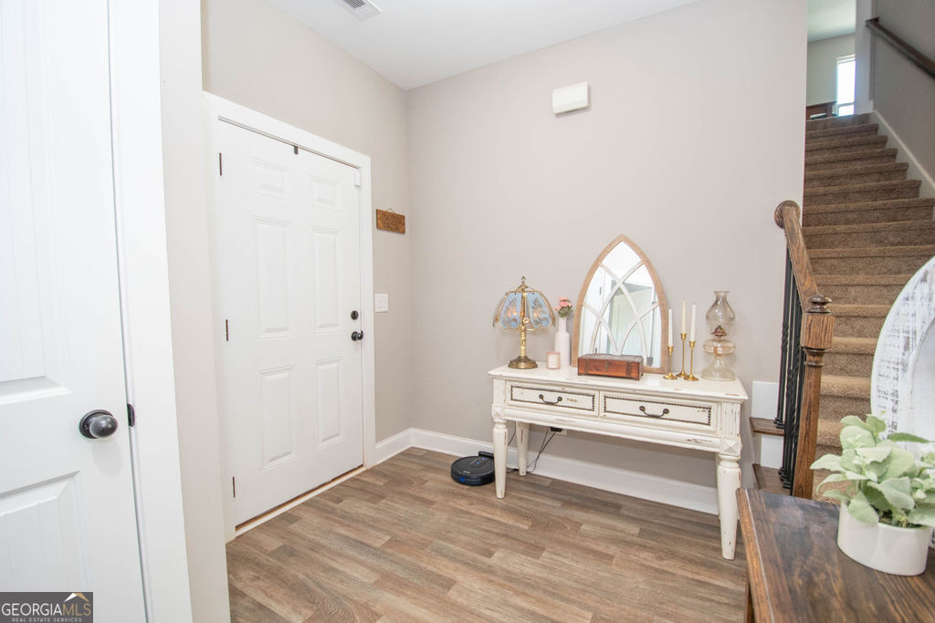 2046 Mcwilliams Barber Road Luthersville, GA 30251 - Photo 20 of 43 a view of kitchen with furniture and wooden floor
