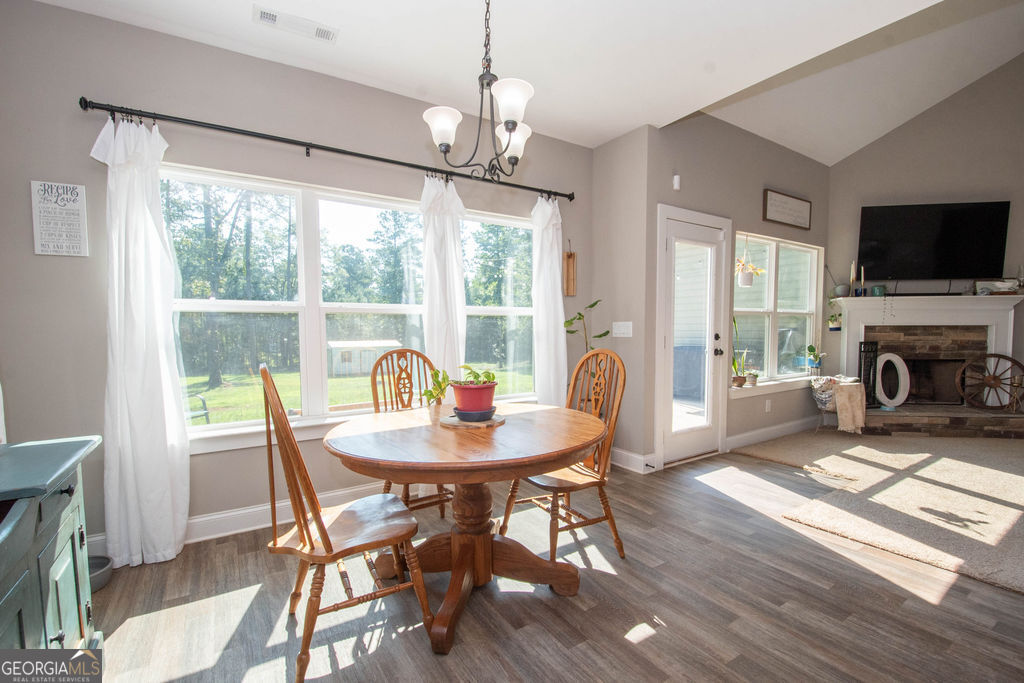 2046 Mcwilliams Barber Road Luthersville, GA 30251 - Photo 26 of 43 a view of a dining room with furniture window and wooden floor