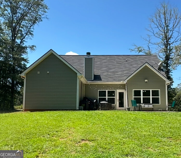 2046 Mcwilliams Barber Road Luthersville, GA 30251 - Photo 3 of 43 a view of a house with a garden