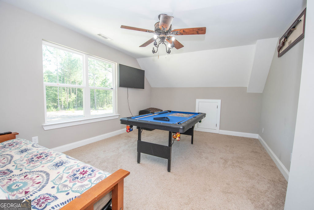 2046 Mcwilliams Barber Road Luthersville, GA 30251 - Photo 41 of 43 a bedroom with a bed and a window
