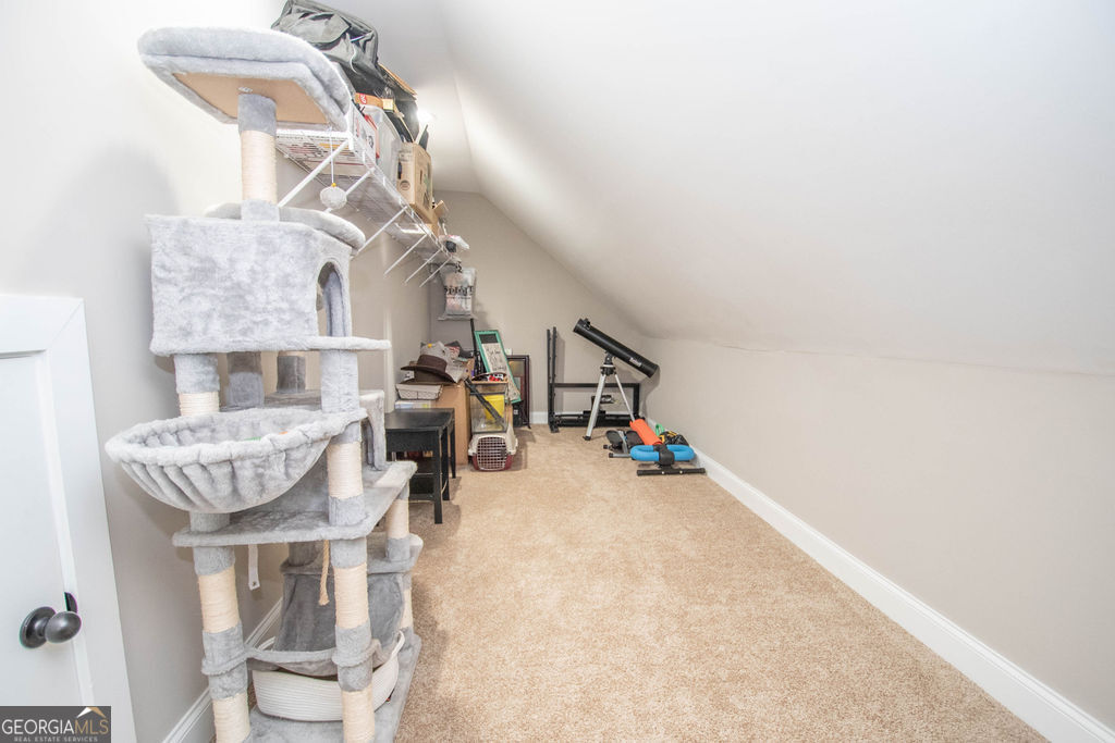 2046 Mcwilliams Barber Road Luthersville, GA 30251 - Photo 43 of 43 a dining room with furniture and a chandelier
