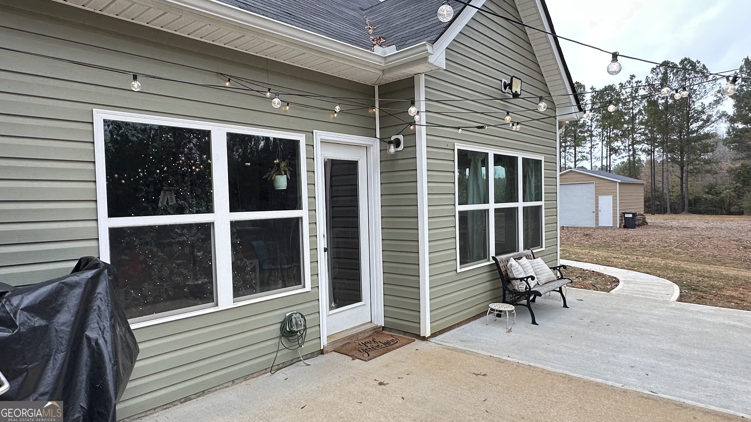 2046 Mcwilliams Barber Road Luthersville, GA 30251 - Photo 7 of 43 a view of a house with backyard and sitting area
