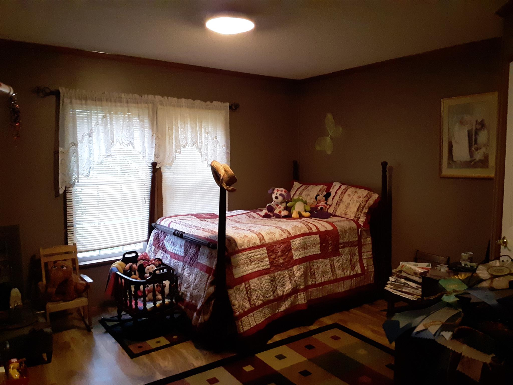 289 Ray Jent Road Bethpage, TN 37022 - Photo 15 of 19 a bedroom with a bed and wooden floor