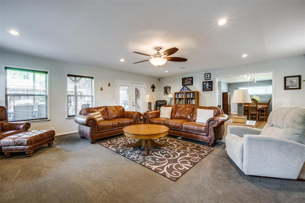 1027 Stanley Street Denton, TX 76201 - Photo 14 of 38 a living room with furniture and a large window