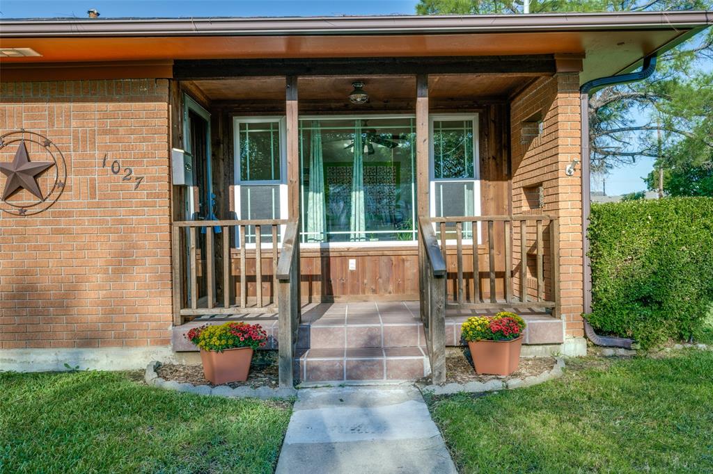 1027 Stanley Street Denton, TX 76201 - Photo 3 of 35 a front view of a house with a porch