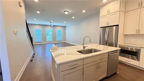 a view of a livingroom with wooden floor
