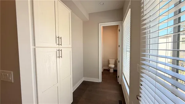 a bathroom with a sink a mirror and a shower