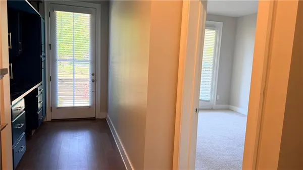a room with window and wooden floor