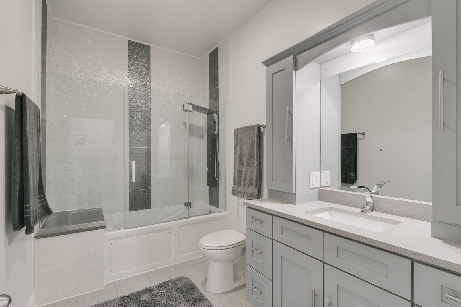 3239 Wesley Avenue Berwyn, IL 60402 - Photo 17 of 29 a bathroom with a granite countertop sink toilet and shower