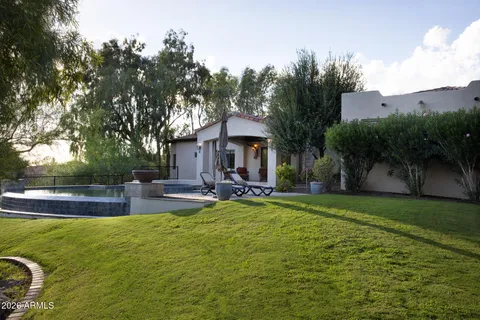 a view of backyard with green space