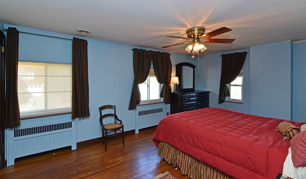 130 Harding Road Pittsburgh, PA 15229 - Photo 12 of 23 The spacious master bedroom provides a lighted ceiling fan, hardwood flooring, a walk-in closet plus an additional closet.