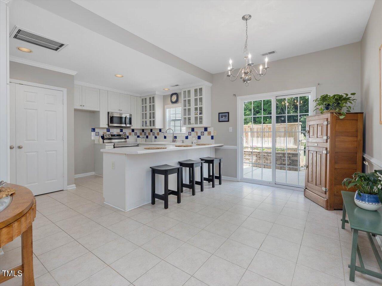 2021 Rivergate Road, Unit 102 Raleigh, NC 27614 - Photo 8 of 42 14-Dining-Kitchen