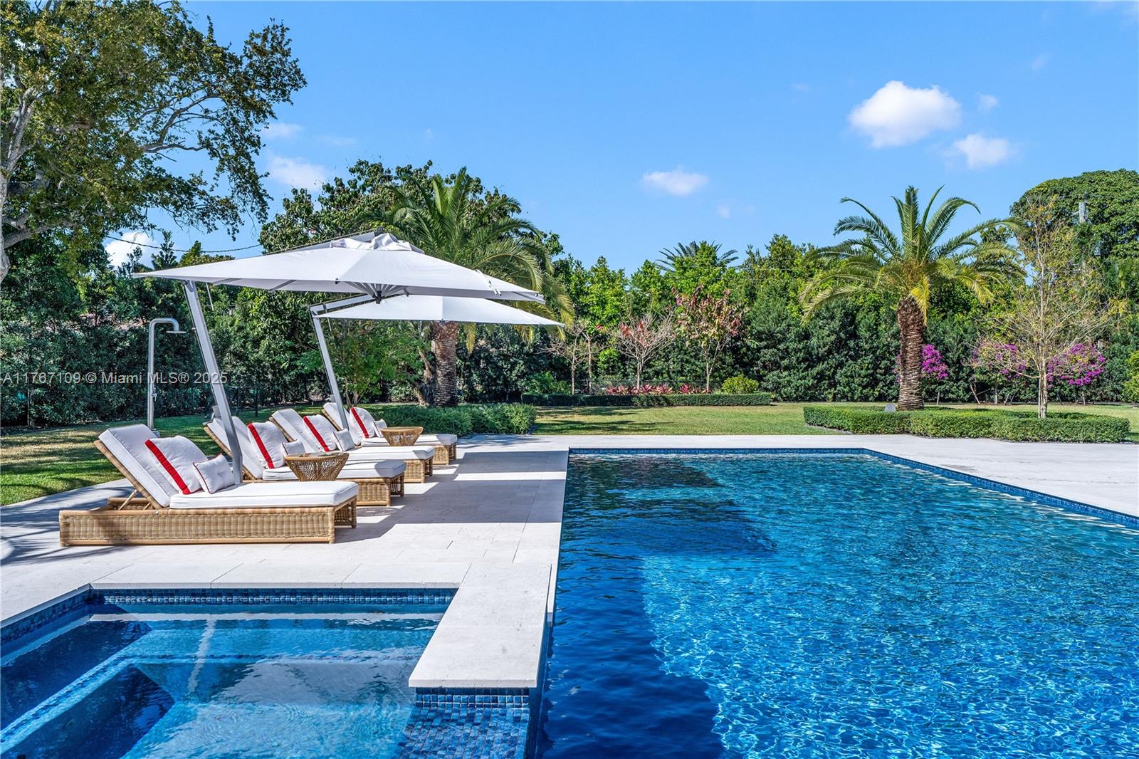 6575 Southwest 96th Street Pinecrest, FL 33156 - Photo 42 of 95 a view of outdoor space yard swimming pool and patio