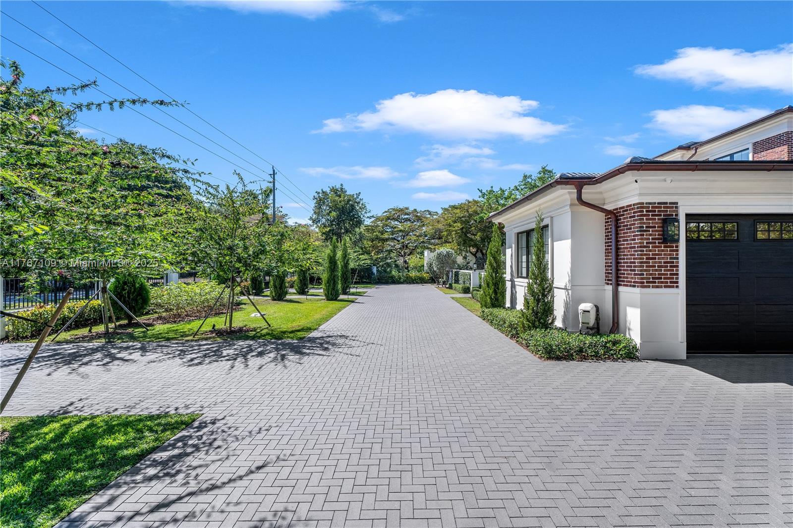 6575 Southwest 96th Street Pinecrest, FL 33156 - Photo 70 of 95 a view of a house with a yard