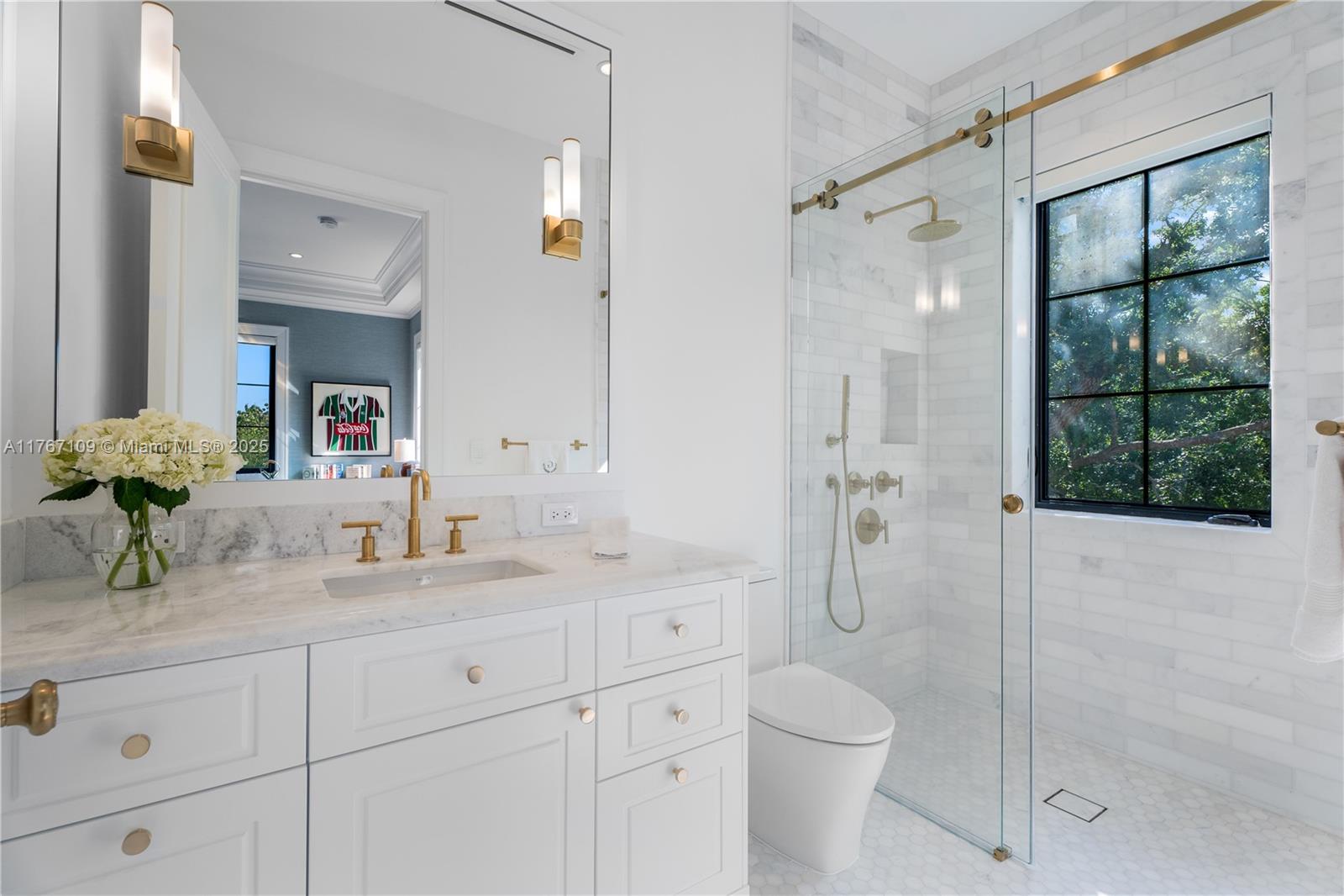 6575 Southwest 96th Street Pinecrest, FL 33156 - Photo 92 of 95 a bathroom with a granite countertop sink toilet and shower