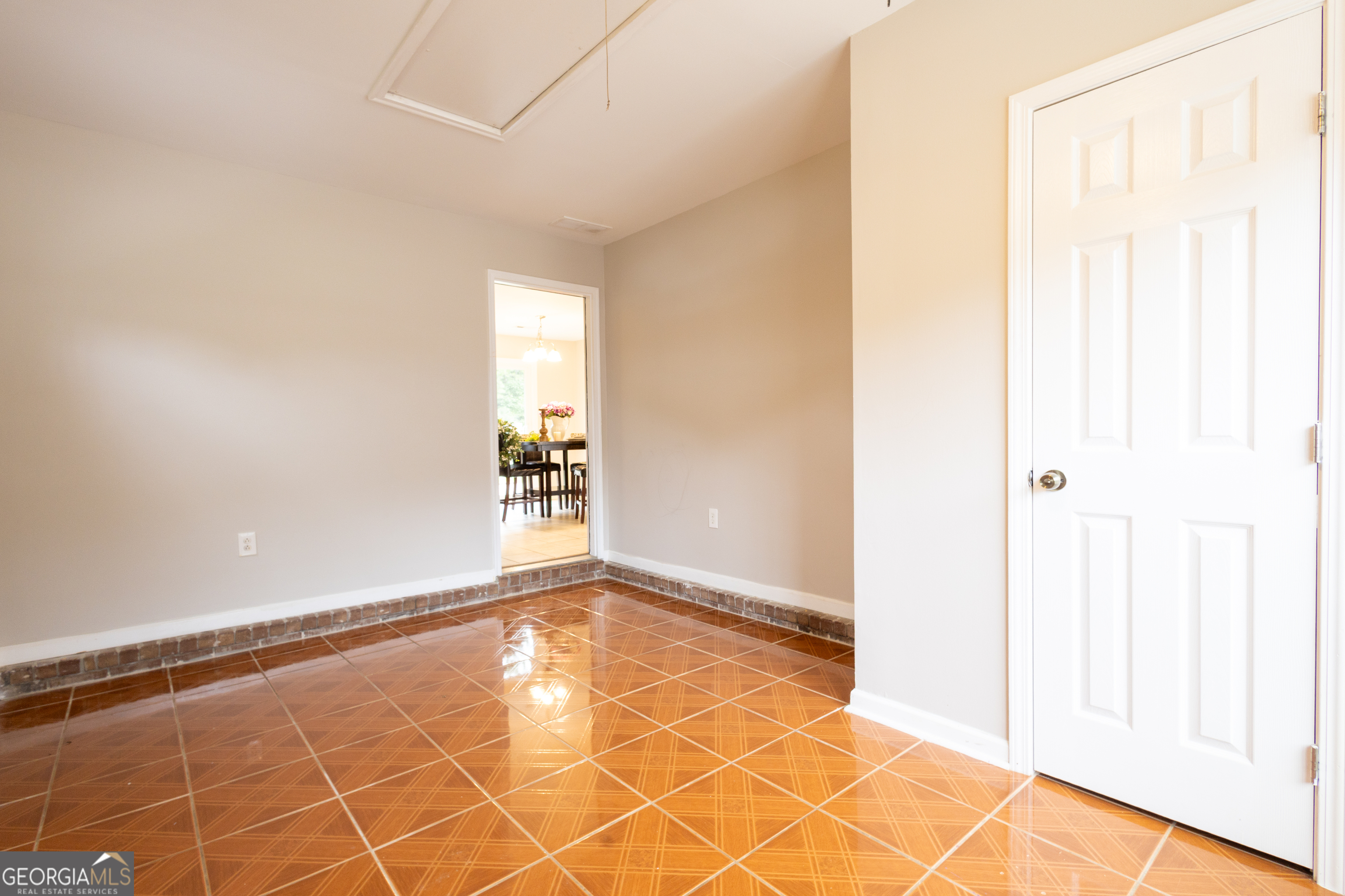 33 Northwest Hunters Glenn Road Rome, GA 30165 - Photo 26 of 43 a view of an empty room with wooden floor and a window