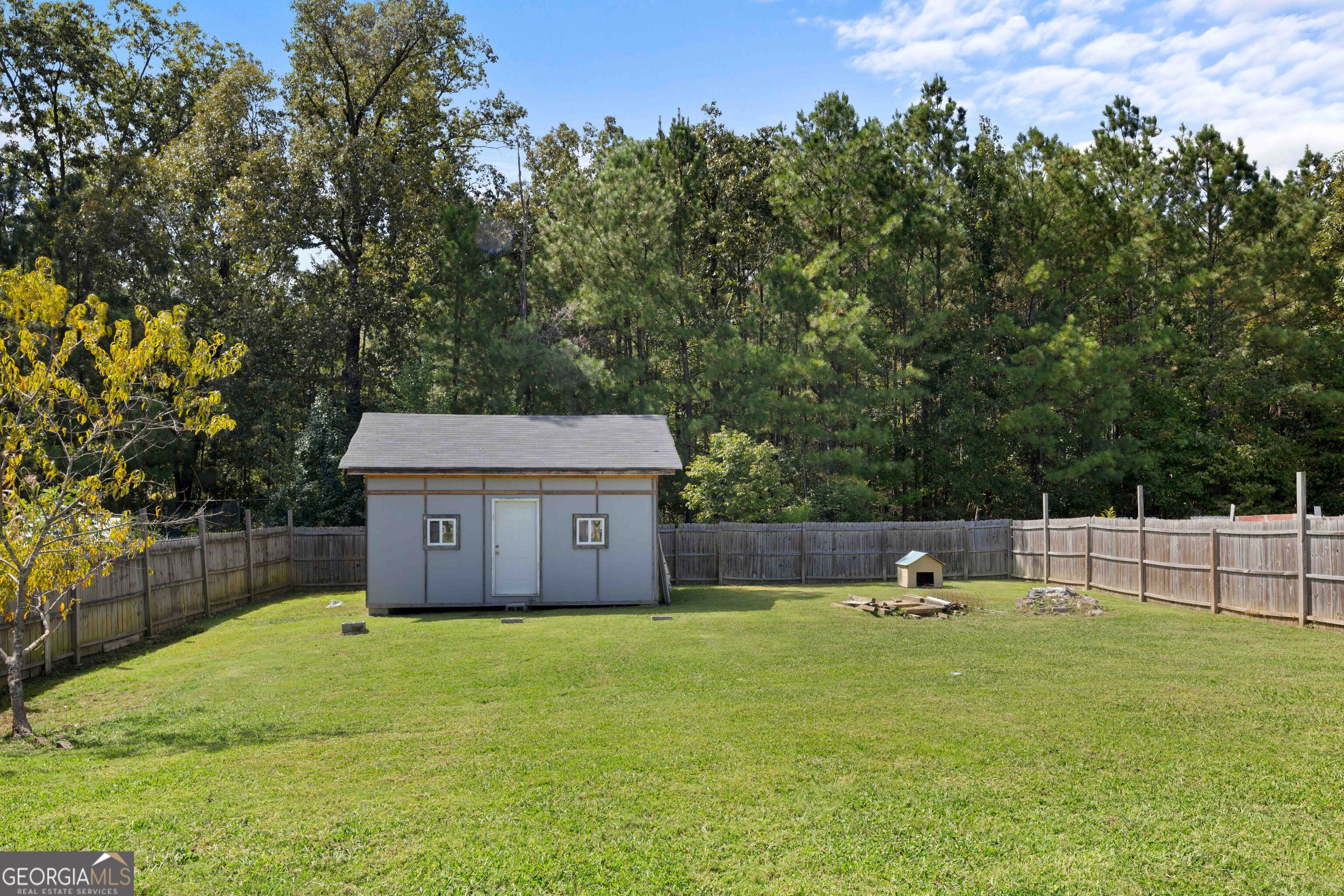 33 Northwest Hunters Glenn Road Rome, GA 30165 - Photo 31 of 43 a view of a house with a backyard